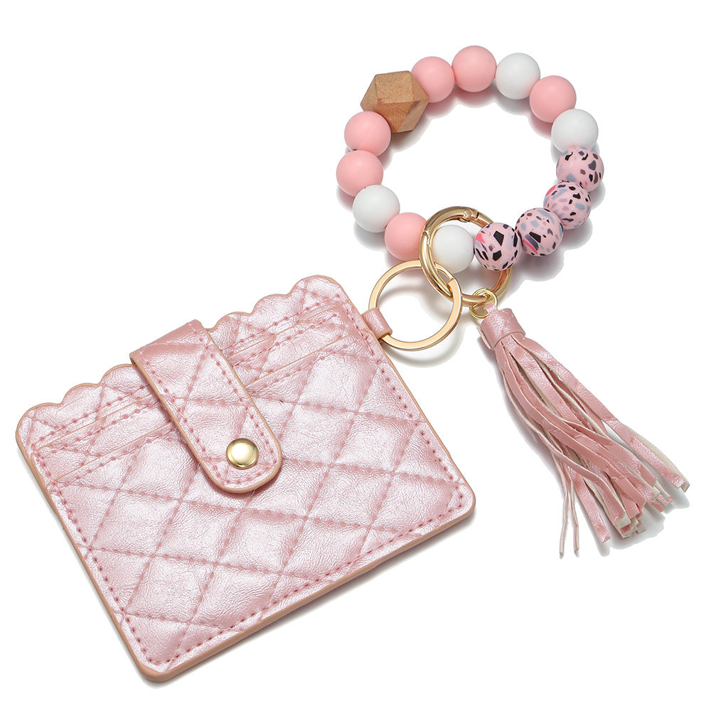 Venta al por mayor Llavero de muñeca con cuentas de silicona para portatarjetas