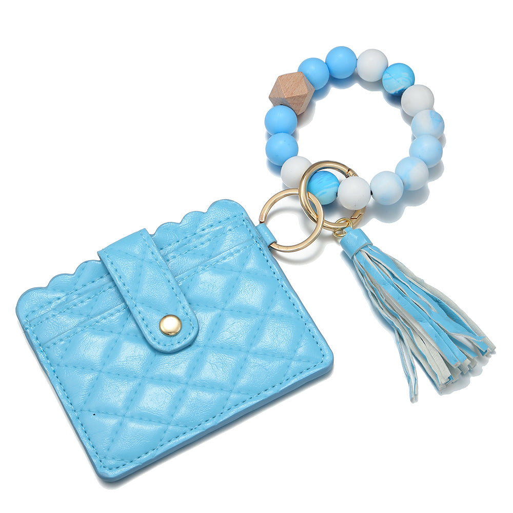 Venta al por mayor Llavero de muñeca con cuentas de silicona para portatarjetas