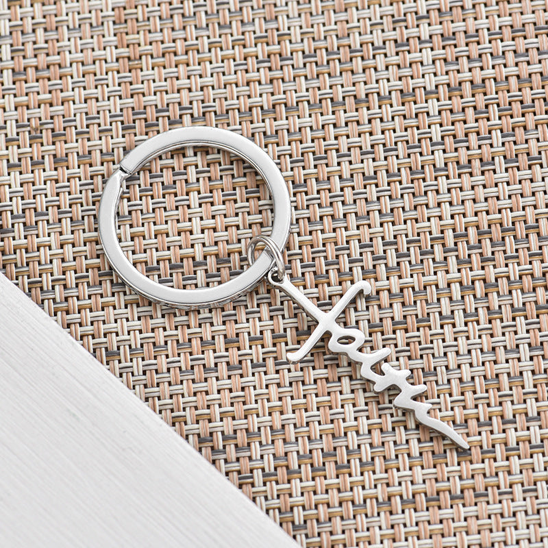 Venta al por mayor Llavero cruzado del alfabeto del acero inoxidable