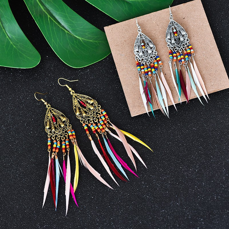 Wholesale Alloy Hollow Long Feather Earrings