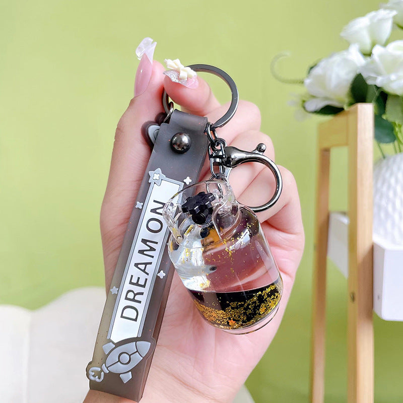Wholesale Acrylic Creative Oil Floating Astronaut Keychain