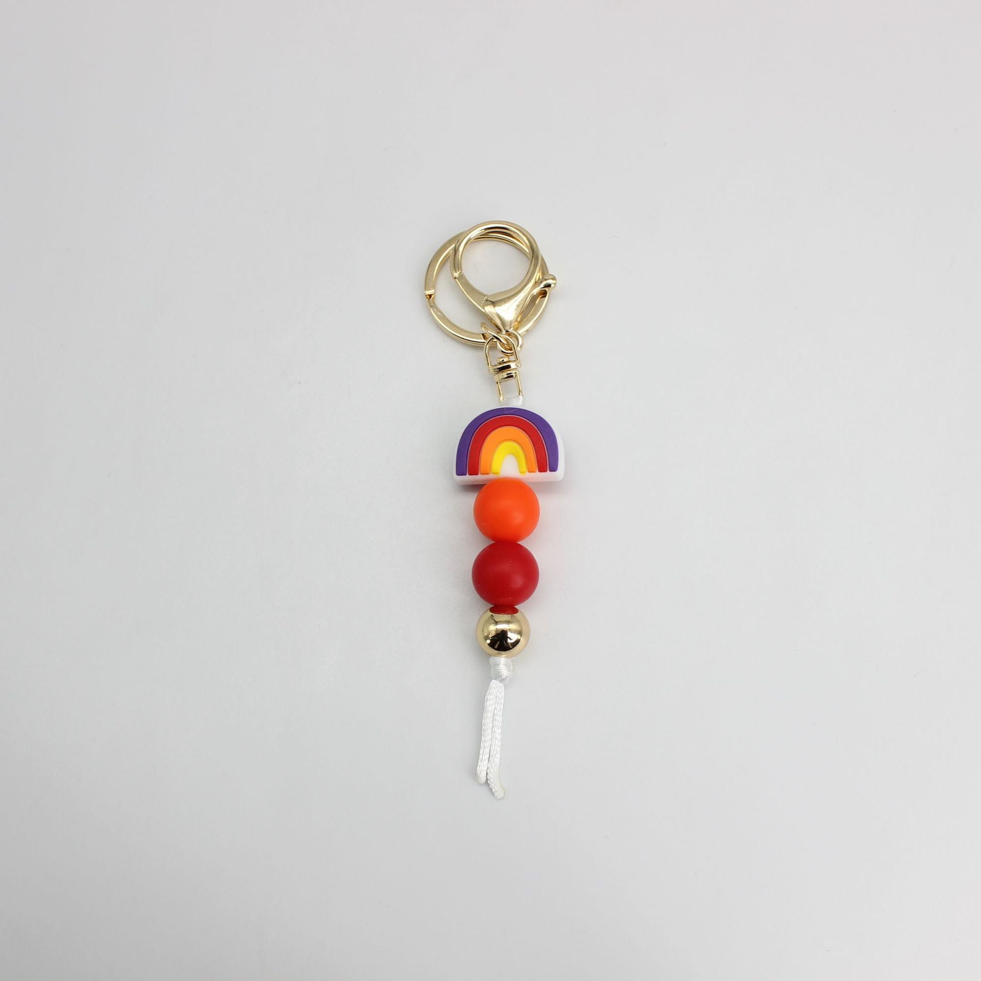 Venta al por mayor Llavero Con Cuentas De Silicona Arco Iris