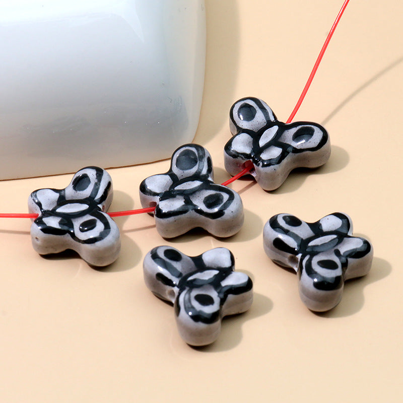 Color al por mayor Peeds de la cadena de cerámica de mariposa pintada a mano.