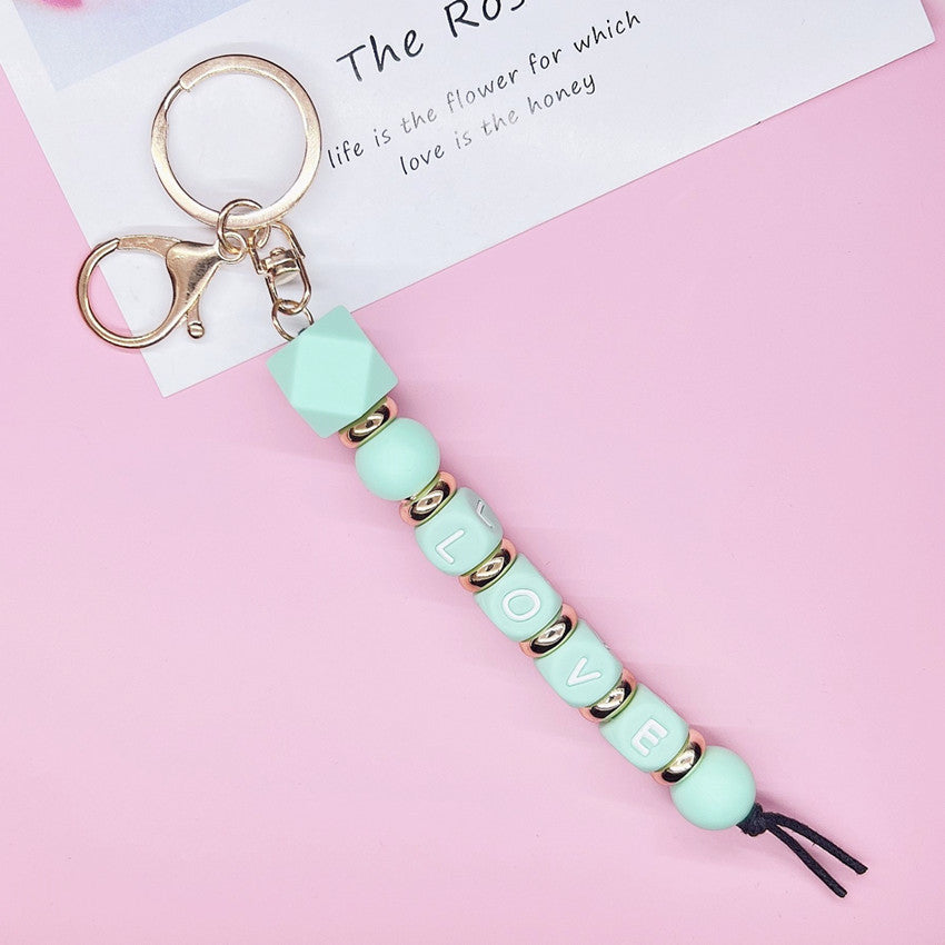 Regalo al por mayor del día de tarjeta del día de San Valentín AMOR Alfabeto Cuentas de silicona Llavero creativo