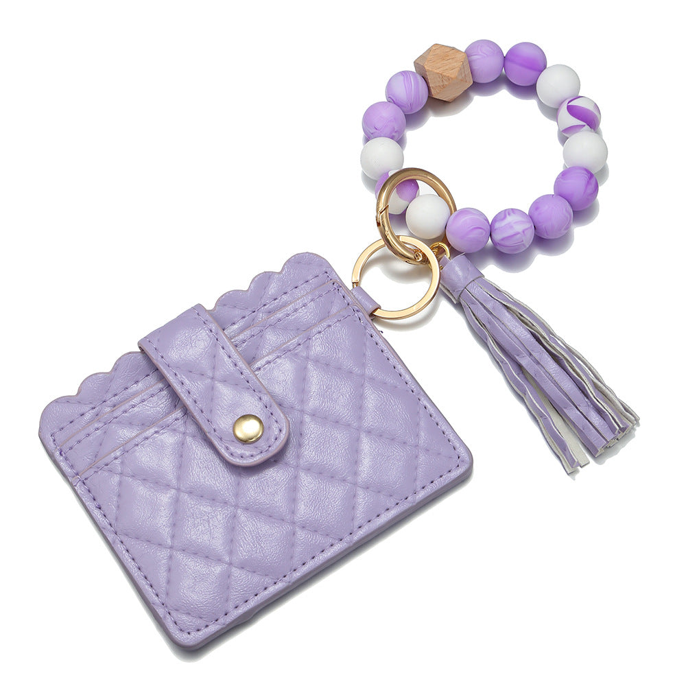 Venta al por mayor Llavero de muñeca con cuentas de silicona para portatarjetas