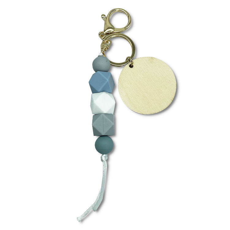 Venta al por mayor Llavero Con Cuentas De Silicona Arco Iris