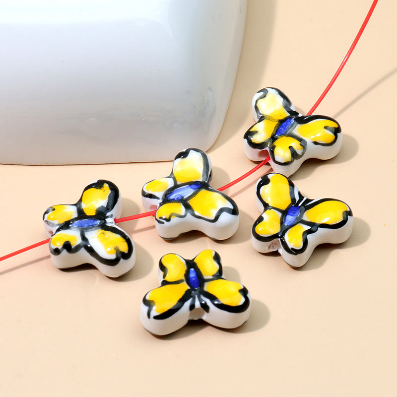 Color al por mayor Peeds de la cadena de cerámica de mariposa pintada a mano.
