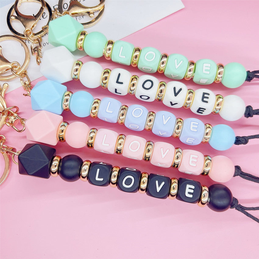 Regalo al por mayor del día de tarjeta del día de San Valentín AMOR Alfabeto Cuentas de silicona Llavero creativo