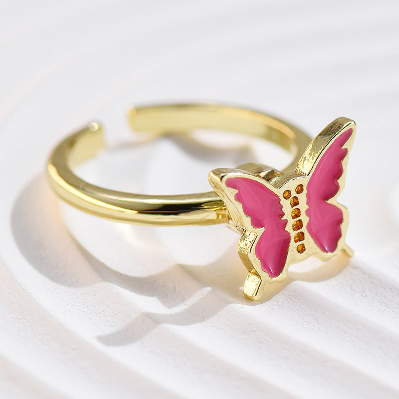 Wholesale Alloy Rotatable Daisy Flower Butterfly Ring