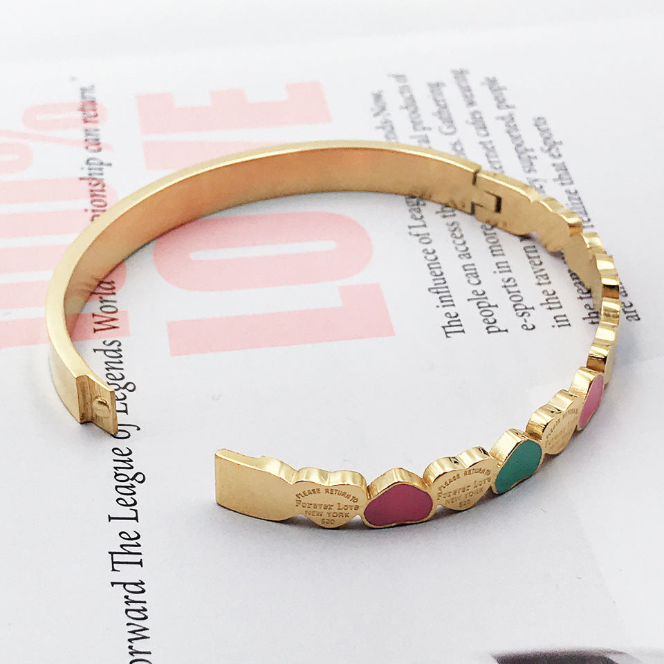 Pulsera chapada en oro de acero inoxidable con corazón de 3 colores al por mayor