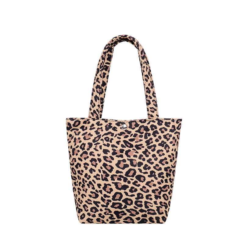 La bolsa de asas de mariposa con estampado de leopardo y estampado de vaca de poliéster al por mayor