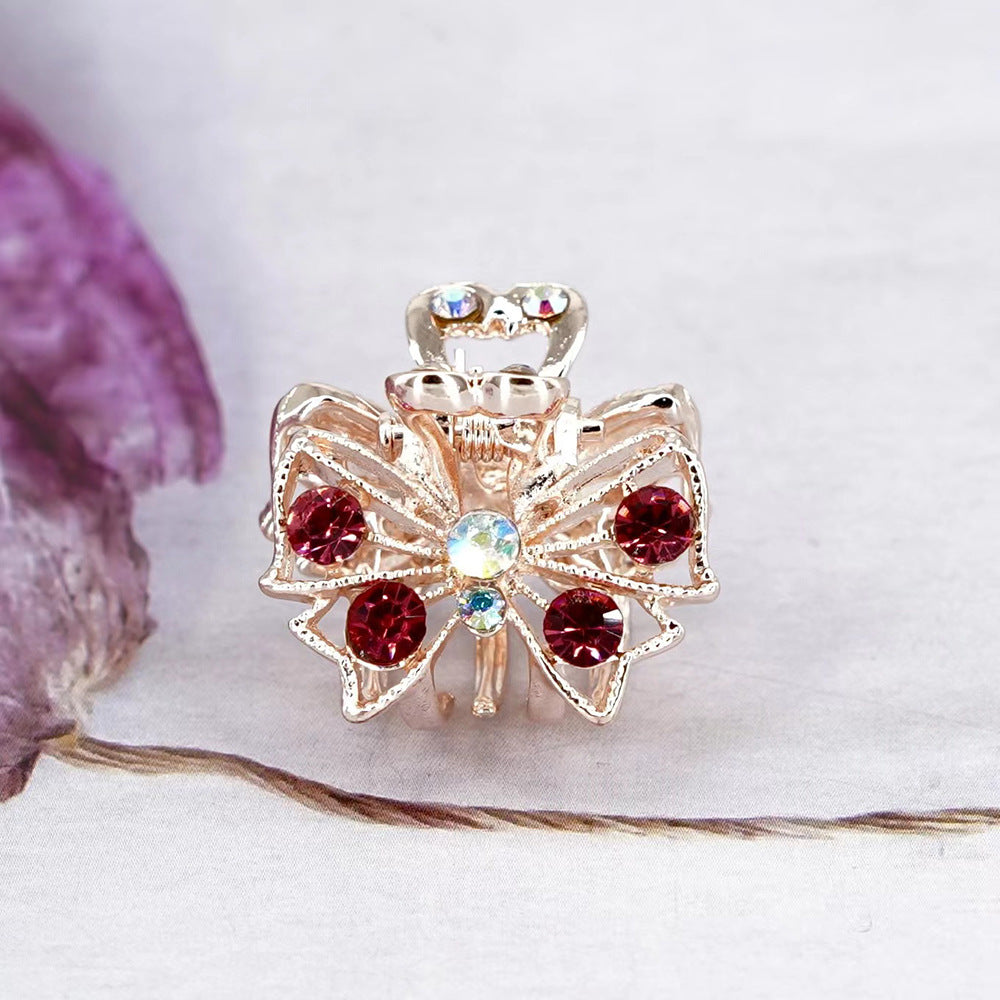 Venta al por mayor Pinza de pelo de aleación de nudo de lazo de diamante