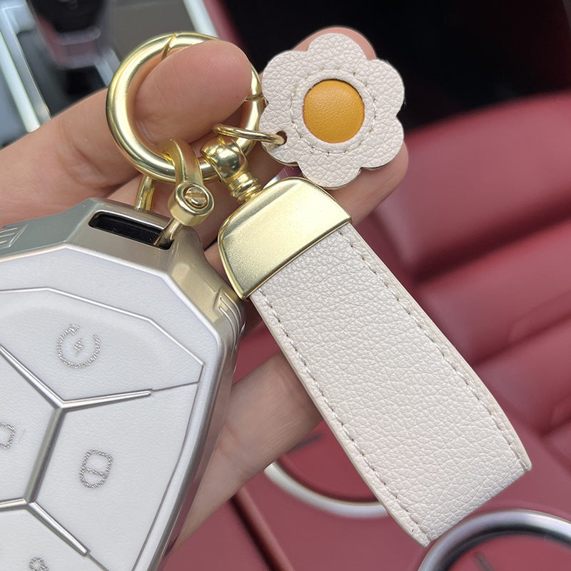 Venta al por mayor Llavero de cordón de fresa de cuero de vaca