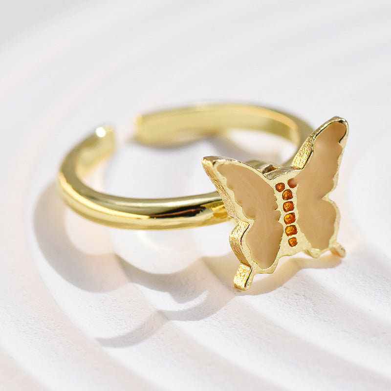 Wholesale Alloy Rotatable Daisy Flower Butterfly Ring