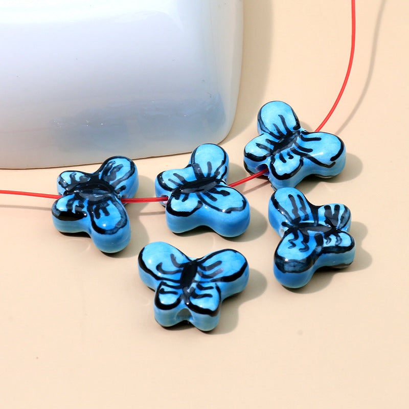Color al por mayor Peeds de la cadena de cerámica de mariposa pintada a mano.