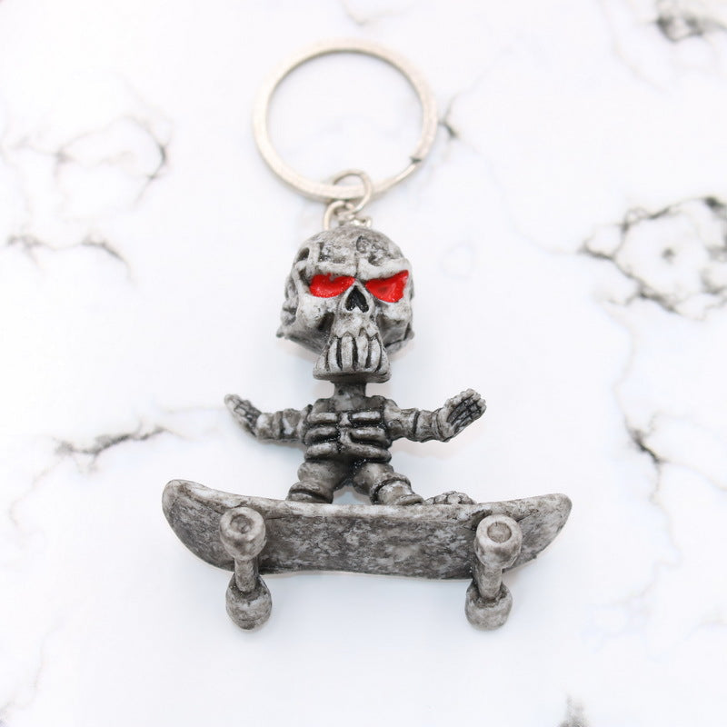 Wholesale Chic Rubber Skull Skateboard Keychain Grey Fashion Accessory For Promotional Gift