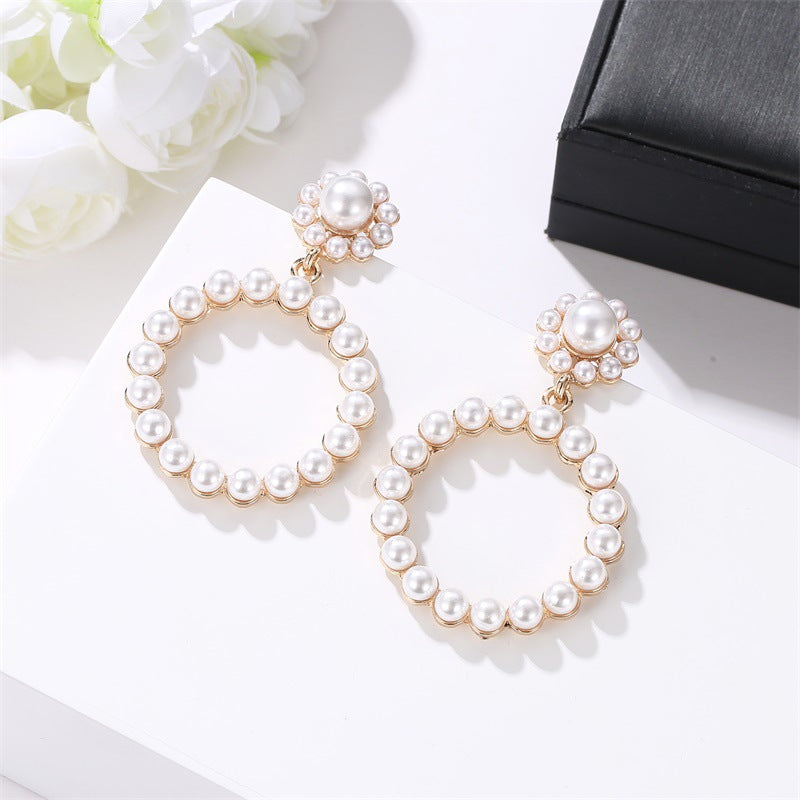 Wholesale Pearl Circle Alloy Earrings