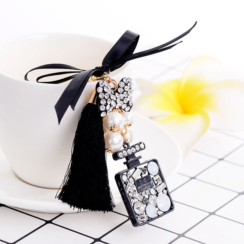Wholesale Bow Ice Silk Tassel Perfume Bottle Zinc Alloy Keychain