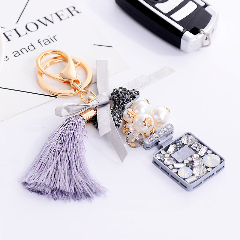 Wholesale Bow Ice Silk Tassel Perfume Bottle Zinc Alloy Keychain