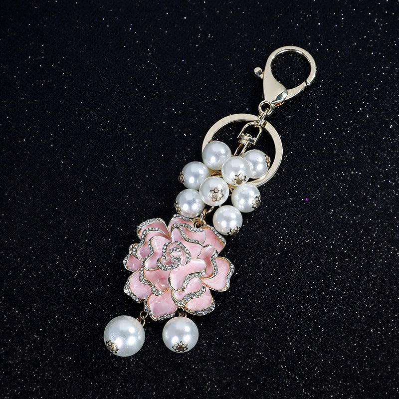Wholesale Flower series oil dripping diamond inlaid camellia metal keychain