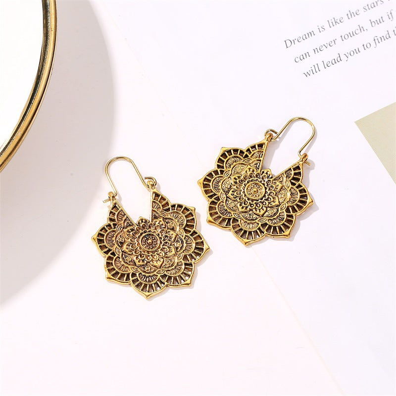 Wholesale Retro Metal Hollow Flower Bohemian Carved Court Style Earrings