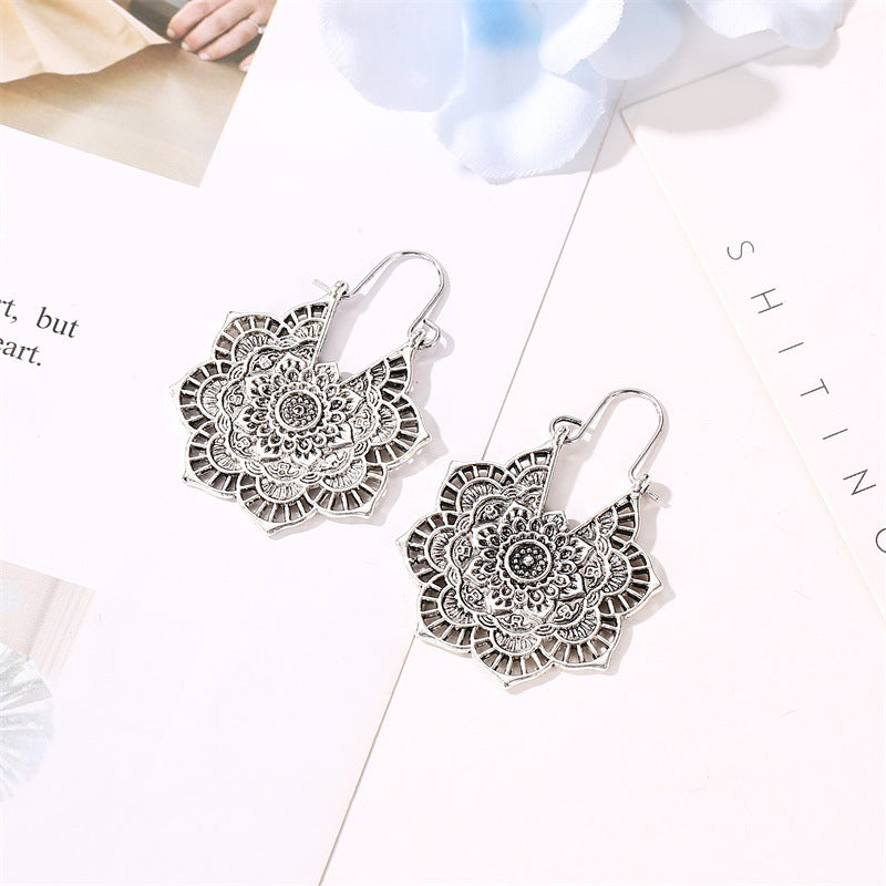 Wholesale Retro Metal Hollow Flower Bohemian Carved Court Style Earrings