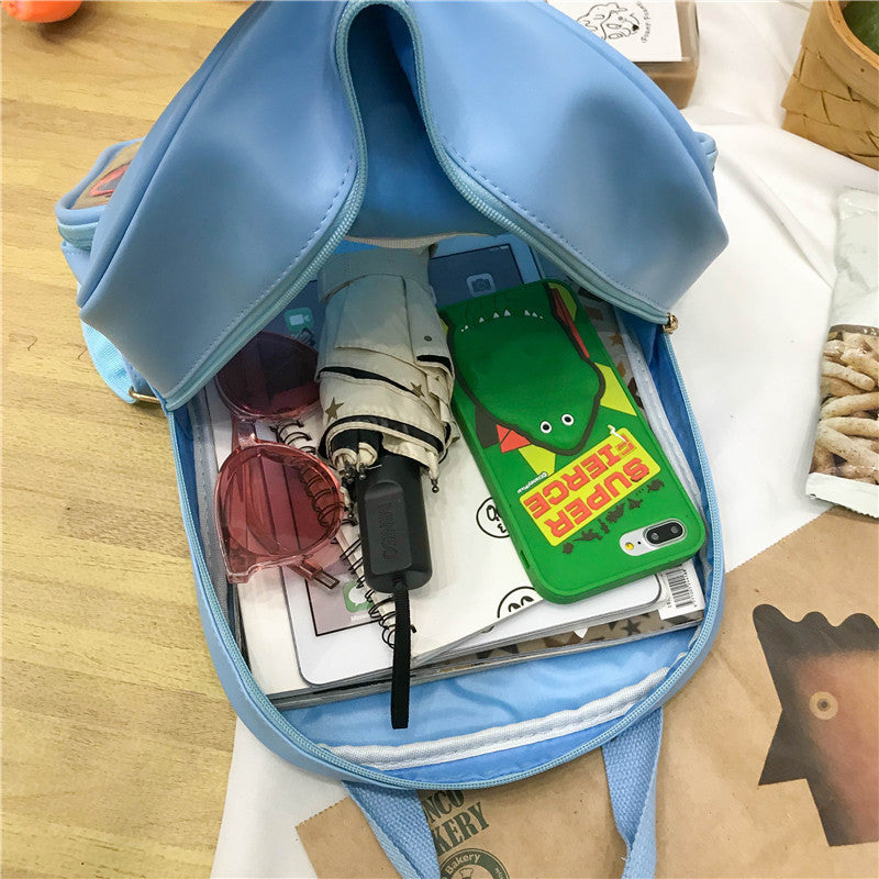 Mochila de bolsa de mensajero transparente de color caramelo de PVC al por mayor