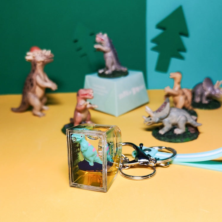 Llavero de dinosaurio engrasado de plástico al por mayor