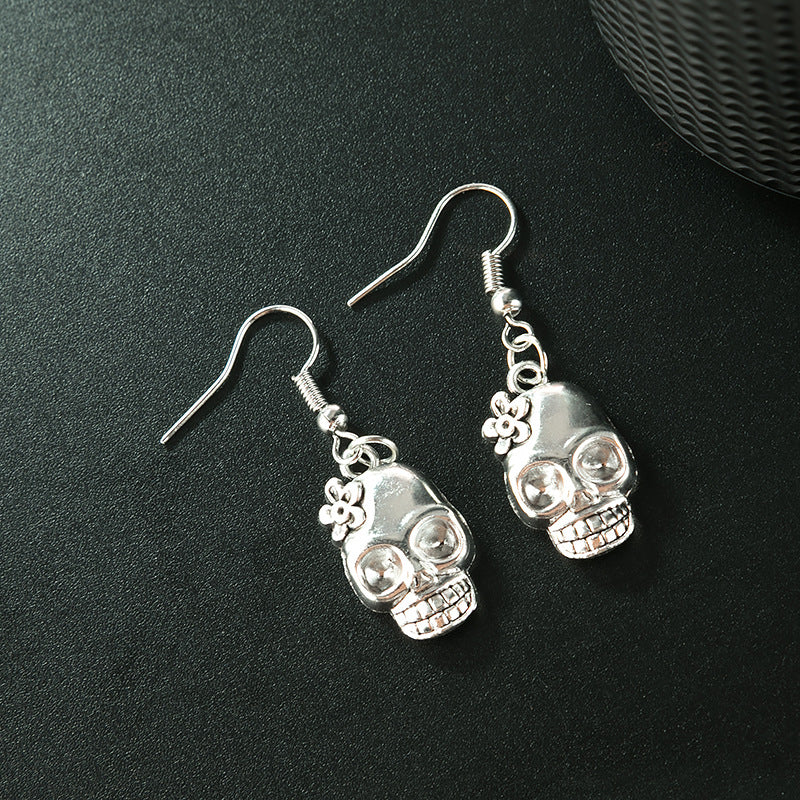 Pendientes de aleación de araña para el ojo de palma del esqueleto al por mayor