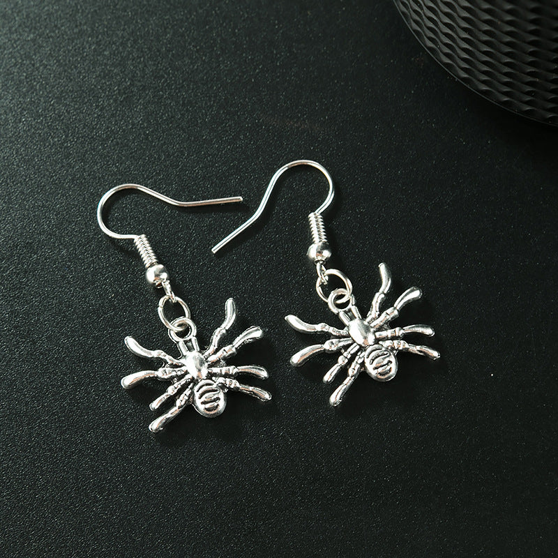 Pendientes de aleación de araña para el ojo de palma del esqueleto al por mayor