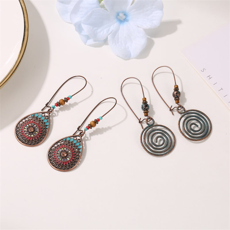 Wholesale Alloy Vintage Green Bohemian Hollow Flower Leaf Earrings For Women Party Gift