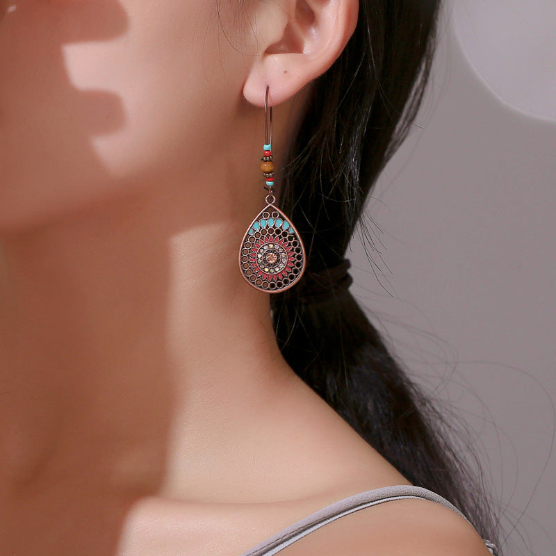 Wholesale Alloy Vintage Green Bohemian Hollow Flower Leaf Earrings For Women Party Gift
