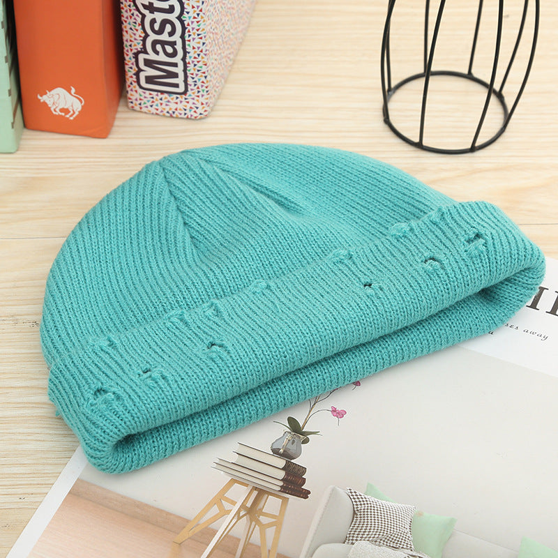 Wholesale Solid Color Hip-hop Hole Melon Skin Knitted Hat