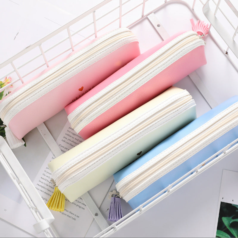 Wholesale Solid Color Pu Tassel Round Triangle Pencil Bag