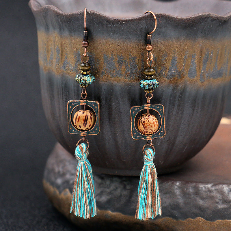 Wholesale Leaf Pendant Hollow Carved Alloy Tassel Earrings