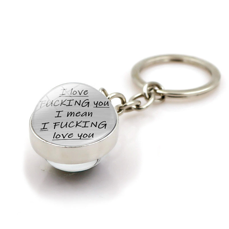 Pareja al por mayor llavero alfabeto colgante de pelota de pelota de vidrio de doble cara