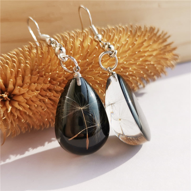 Wholesale  selling resin drop glue dandelion dried flower earrings and the United States dried flower earrings manufacturers