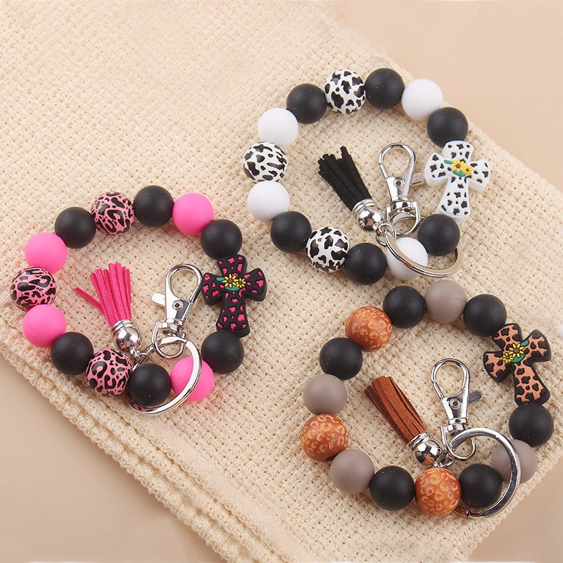 Wholesale Silicone Leather Wooden Beads Tassel Print Leopard Bracelet Keychain
