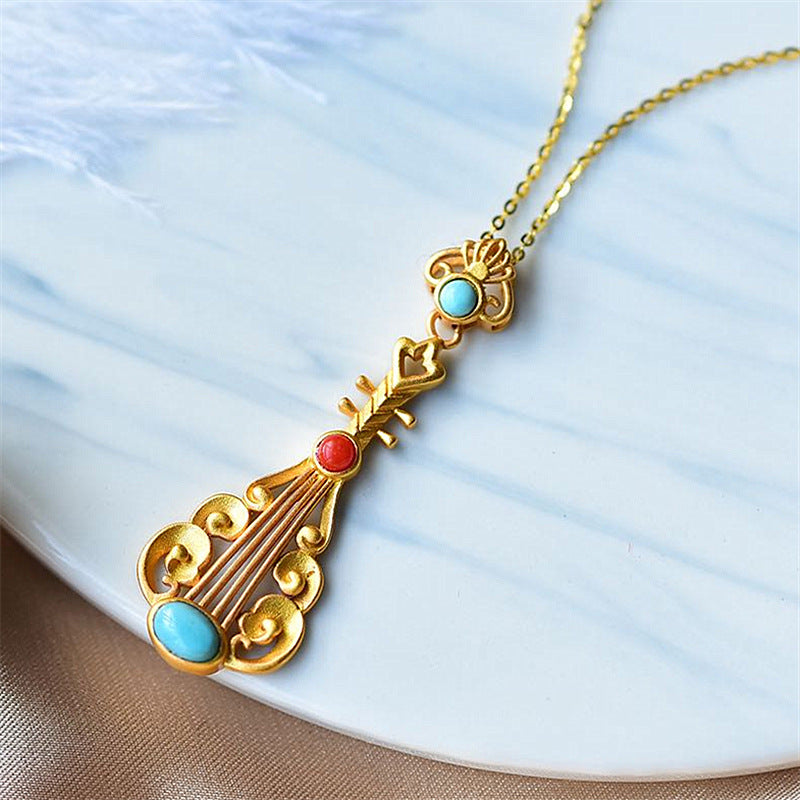 Wholesale Sand gold inlaid turquoise and red Nanhong personality pipa clavicle necklace