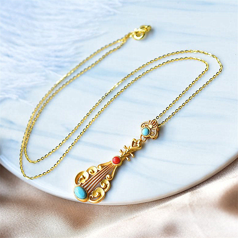 Wholesale Sand gold inlaid turquoise and red Nanhong personality pipa clavicle necklace
