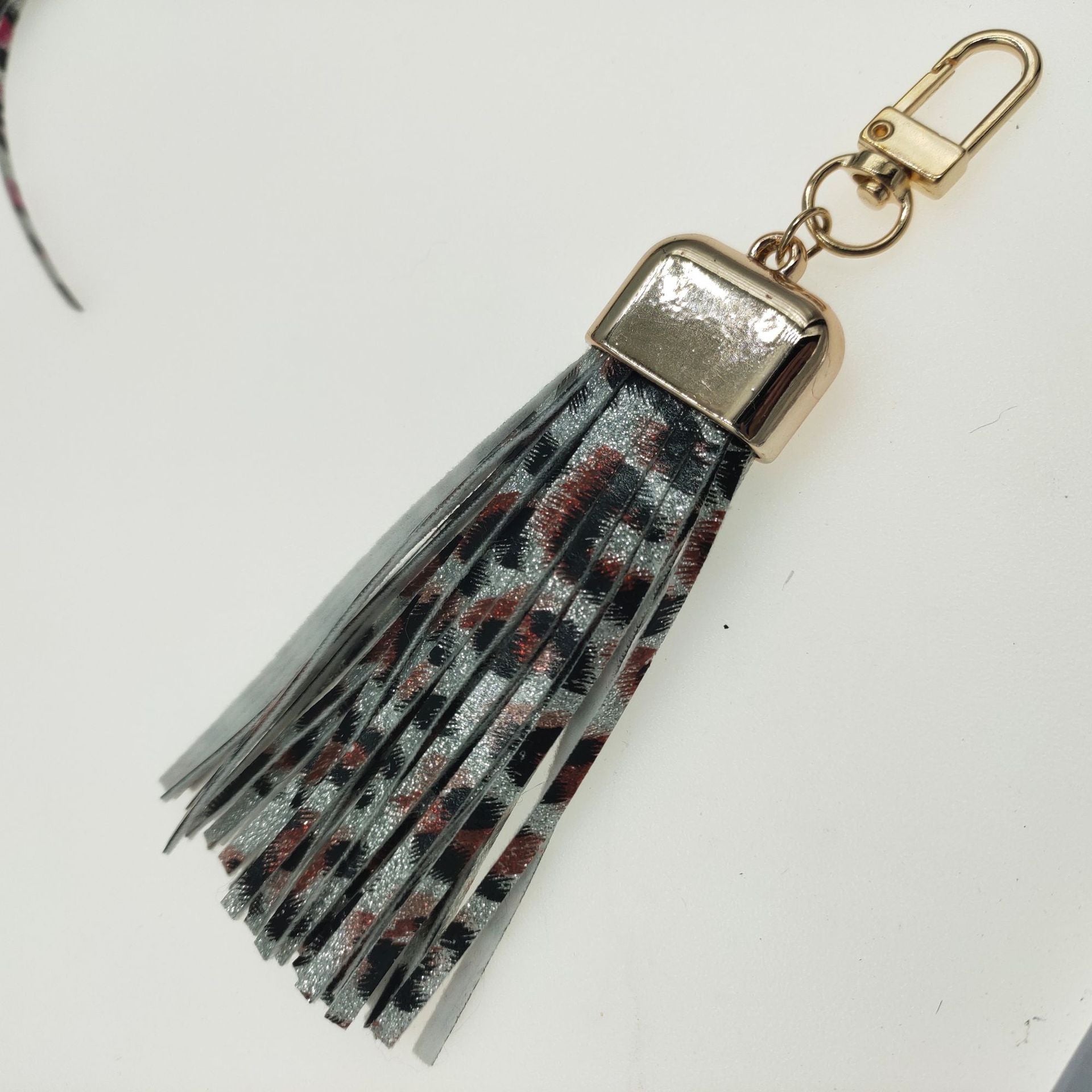Wholesale Leopard Flower Leather Tassel Keychain