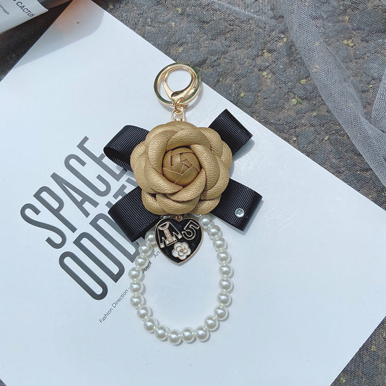 Wholesale PU Bow Camellia Keychain