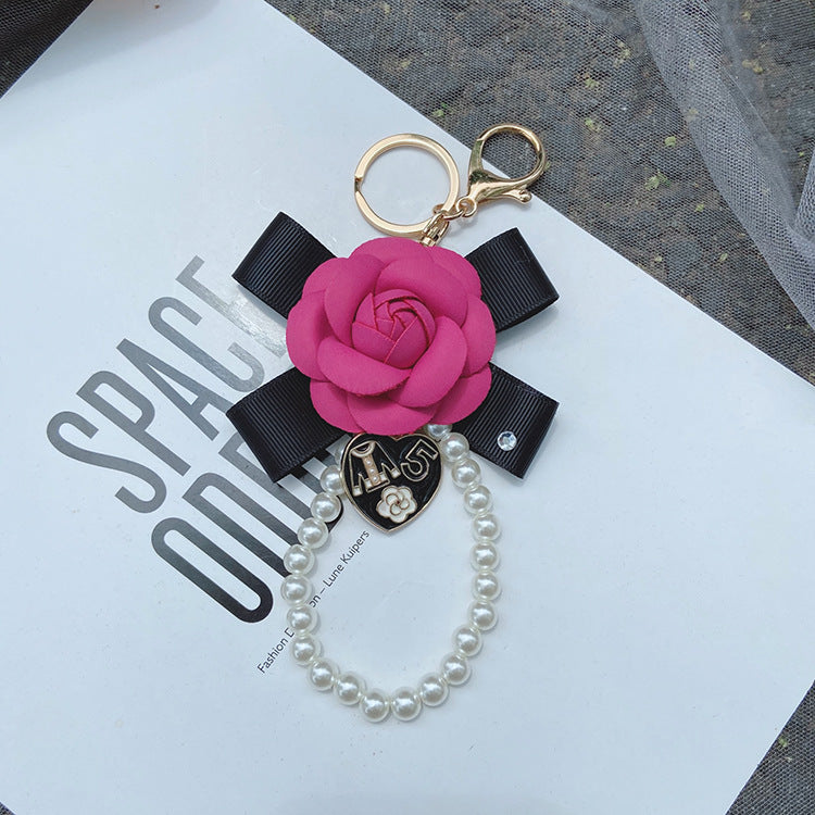 Wholesale PU Bow Camellia Keychain