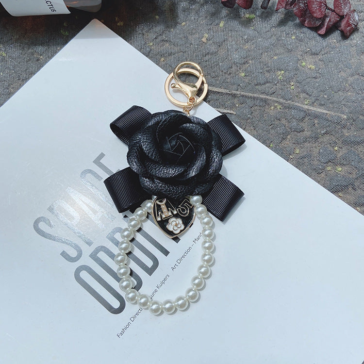 Wholesale PU Bow Camellia Keychain
