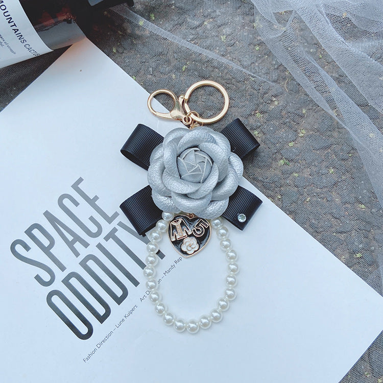 Wholesale PU Bow Camellia Keychain