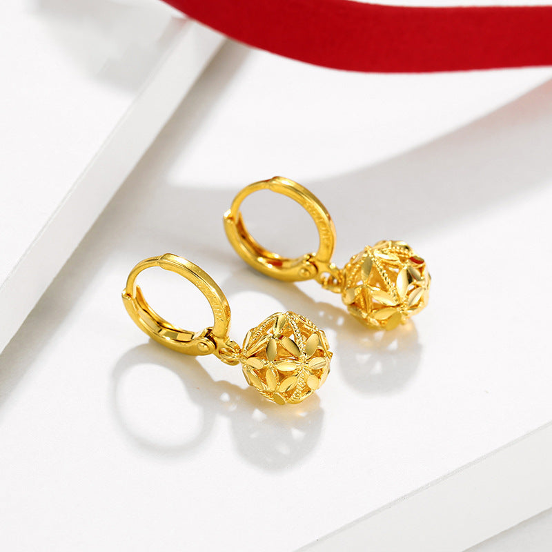 Wholesale Alloy Electroplated Hollow Four Leaf Ball Flower Retro Earrings