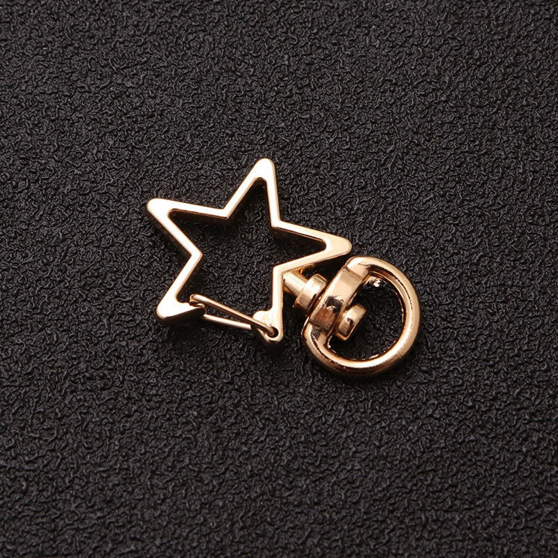 Wholesale shaped keychain metal cat dolphin love five-pointed star cherry blossom shell jewelry accessories diy