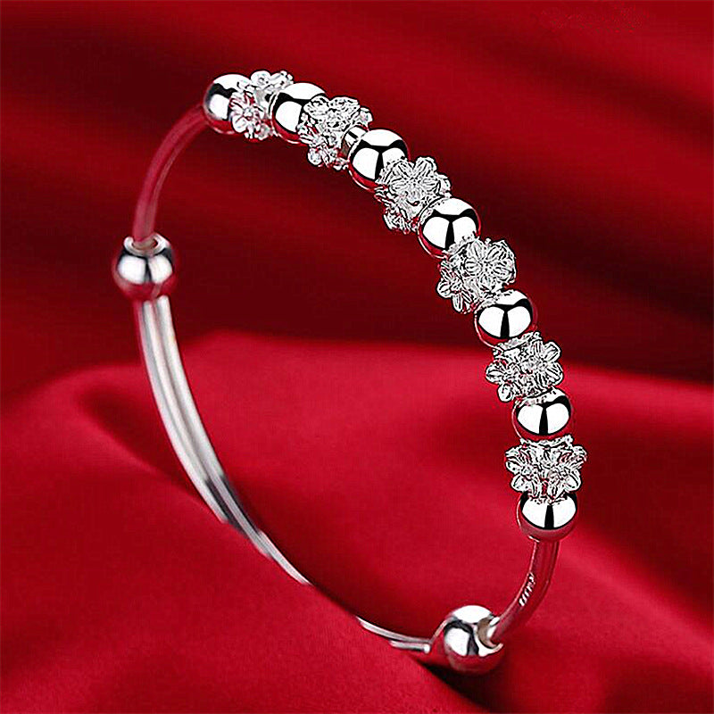 Wholesale Plum blossom rotating bead bracelet