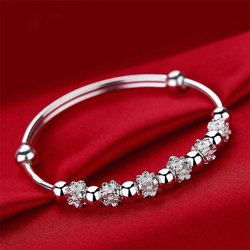 Wholesale Plum blossom rotating bead bracelet