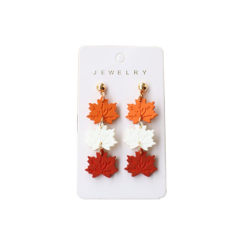 Wholesale Imitation Soft Pottery Hand Feel Spray Painted Acrylic Cat Maple Leaf Earrings
